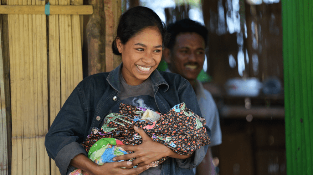 Oliviana and her family returned home with smiles after a successful delivery at the health facility.